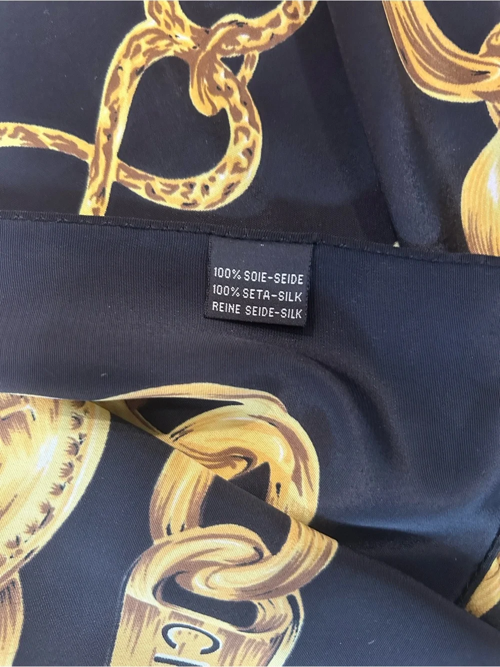 CHANEL Black and Gold Silk Scarf with Chain Motif